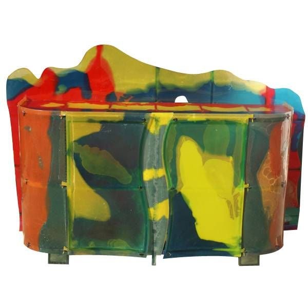 A mid century modern sideboard or cabinet designed by Gaetano Pesce for Zerodesegno. Handmade of Pesce's famous multi-colored resin this buffet is especially vibrant.