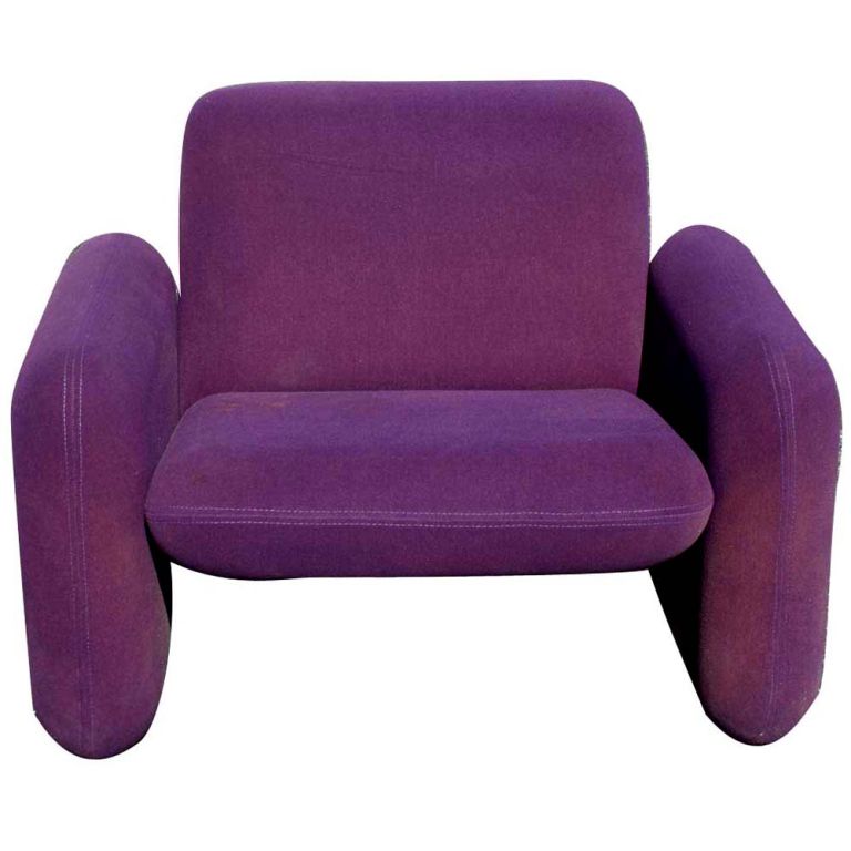 A pair of mid century modern lounges designed by Ray Wilkes for Herman Miller.  The cushions and arms are in the form of large pieces of Chiclet gum.  The chairs upholstered in purple wool blend fabric.
VISIT our STOREFRONT for more Chiclet chairs