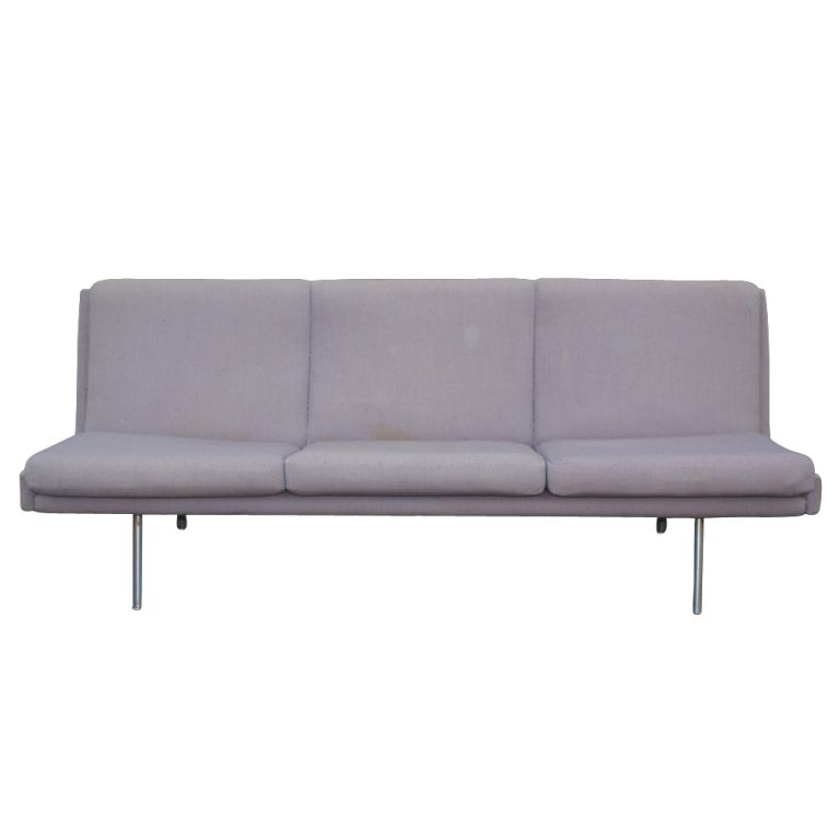 A Mid-Century Modern Danish sofa designed by Hans Wegner. A streamlined form without arms and tubular chrome legs. Upholstered in it's original lilac fabric.