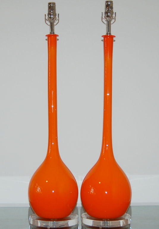 Blown by Seguso in the 1960s, these are a perfect example of Mid Century Modern style meets Op Art.  The tall slender neck and simple design are great representatives of the Eames era when Psychedelic Orange was the color du jour!<br />
<br