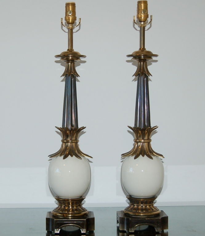 Beautiful mid century lamps with ceramic ostrich egg, complemented by brass and pewter colored accents.<br />
 <br />
They stand 28 1/2