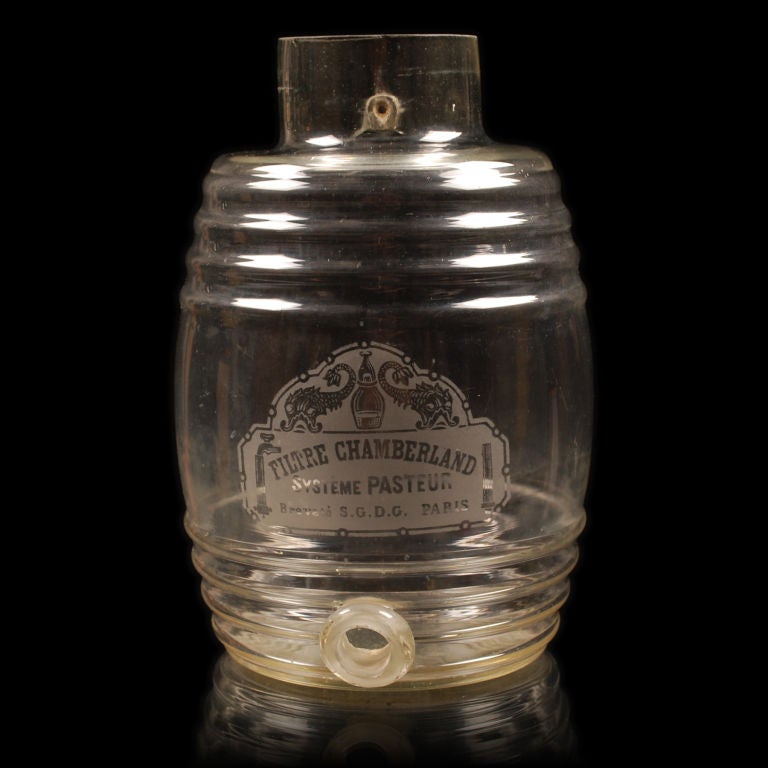 Wonderful vintage French Water Dispenser with a beautiful etched glass front. It reads: Filtre Chamberland Systeme Pasteur, Brevete S.G.D.G. Paris. Loosely translated it says Chamberland Filter System of Paris, Patented. This is would make a nice