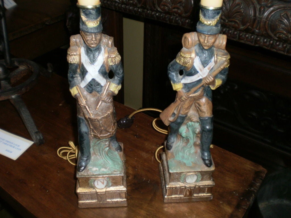 Great pair of French porcelain soldier lamps, newly wired. Would look great in a Hollywood Regency or neoclassical interior.