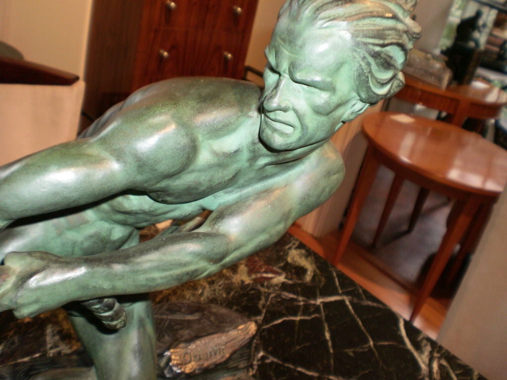 Fine period French Art Deco bronze athlete on marble base, signed Ouline, circa. 1930.  See photos for signature.

  