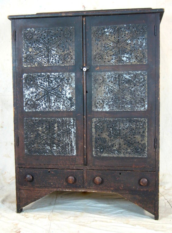 Stained and painted twelve tin pie safe safe with five shelves interior and two lower drawers from Loudoun County Virginia