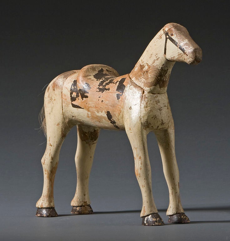 Dappled Horse<br />
Jointed wood with original polychrome.<br />
Horse hair tail.