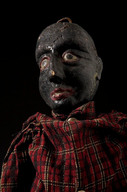 African American Puppet<br />
Wood with hand stitched linen trousers and cotton plaid shirt.<br />
Hand painted face.