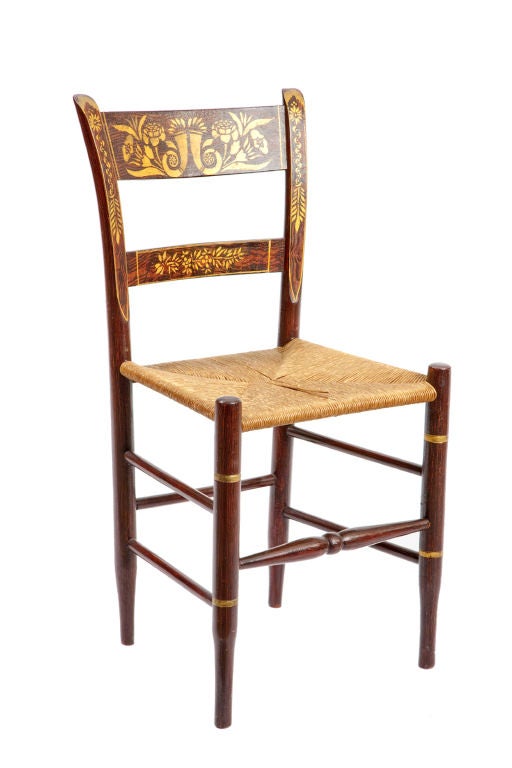 Set of Six Gilt Decorated Chairs<br />
19th century<br />
Rosewood graining with gilt decoration design on backs. Hand woven rush seats. Turned front stretchers, bamboo turned legs with gilt details.