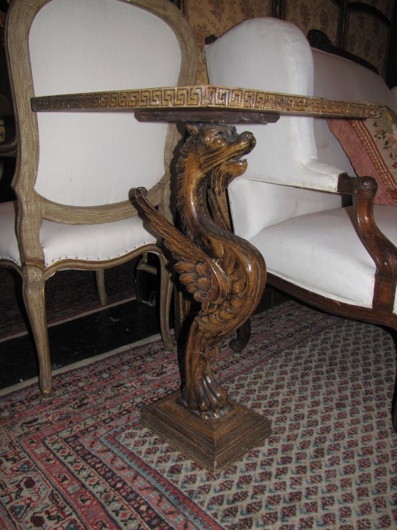 Pair of 19th C Italian carved wood gargoyle tables with glass tops