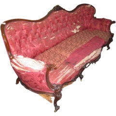 Late Victorian carved walnut sofa