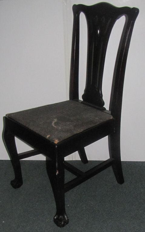 Set of ten Chippendale mahogany dining chairs with ball and claw feet, comprised of 2 arm and 8 side chairs.