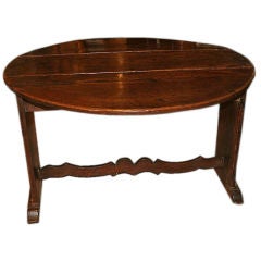 Italian Renaissance Walnut Oval Center Table