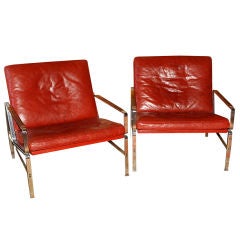 Pair of Vintage German Red Leather Arm Chairs