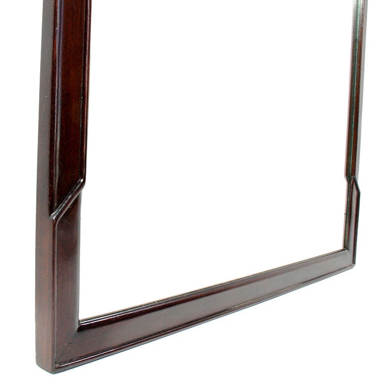 Large Modernist Mirror with Subtle Sculptural Details, American, circa 1950's. Sculptural hand carved details at each of the corners. It has been refinished in an ultra-deep brown lacquer.