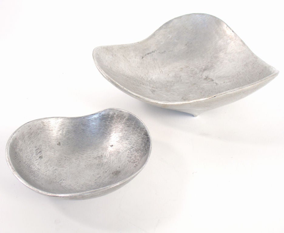 Collection of Biomorphic Aluminum Bowls hand made by Bruce Fox, circa 1950's. Bruce Fox was a young artist, sculptor, and visionary in 1938 when, upon returning to the United States after an adventure through Central America, he founded his own