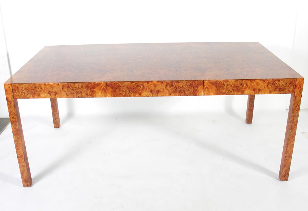 Clean Lined Burl Wood Desk, designed by Milo Baughman for Thayer Coggin, circa 1970's. Simple, yet elegant design executed in beautifully burled wood with a thick, high gloss lacquer finish. This piece is a large scale, versatile size and could be