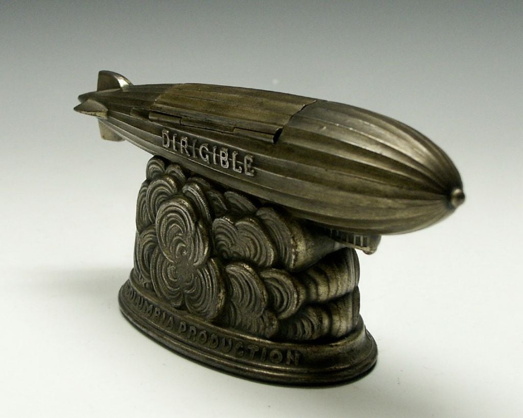 This is a rare and desirable promotional item from the movie DIRIGIBLE based on the book by Frank A. Andrews from a story by Lt. Comdr. Frank Wilber Wead U.S.N.  Directed by Frank Capra, DIRIGIBLE tells the story of a airship commander Jack Bradon