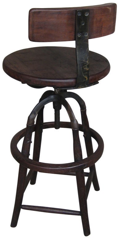 Bar stool with backrest.