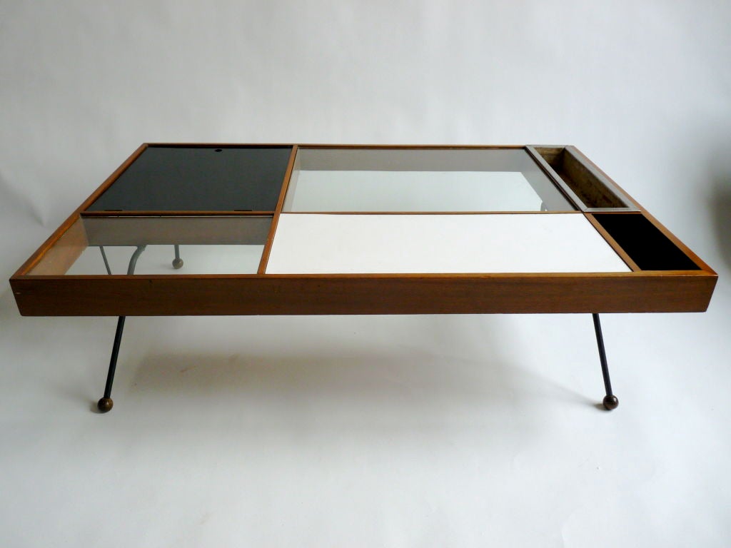 Rare Milo Baughman Coffee Table for Glen of California.  Coffee table has two glass panels, one solid white masonite panel, one black masonite panel concealing a magazine holder, one planter, and one box.