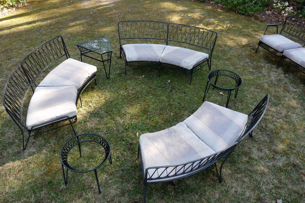 Rare large seating group set and tables designed by Maurizio Tempestini for Salterini.  Ribbon series design.  Set consists of three settees, one three seat sofa with arms,pair round side tables, one triangle table.  The three seat sofa can be used