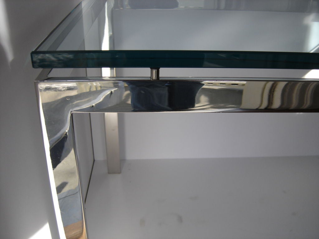 Polished stainless steel table with 3/4" glass