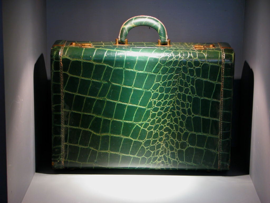 Emerald Green Crocodile Embossed Leather Suitcase<br />
brass hardware and grey nylon interior