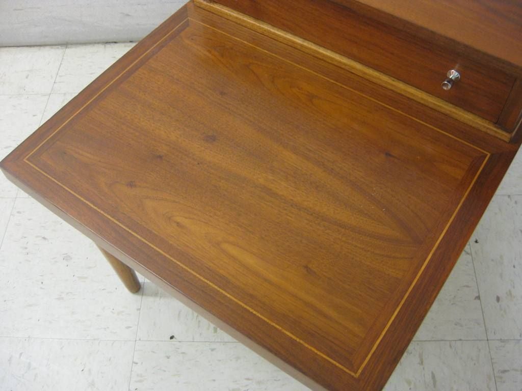We have a huge selection of end lamp tables, pair of two-tier bedside after Edward Wormley, these nightstands are of Mid century moderne 2 tier design, recently fully refinished.

