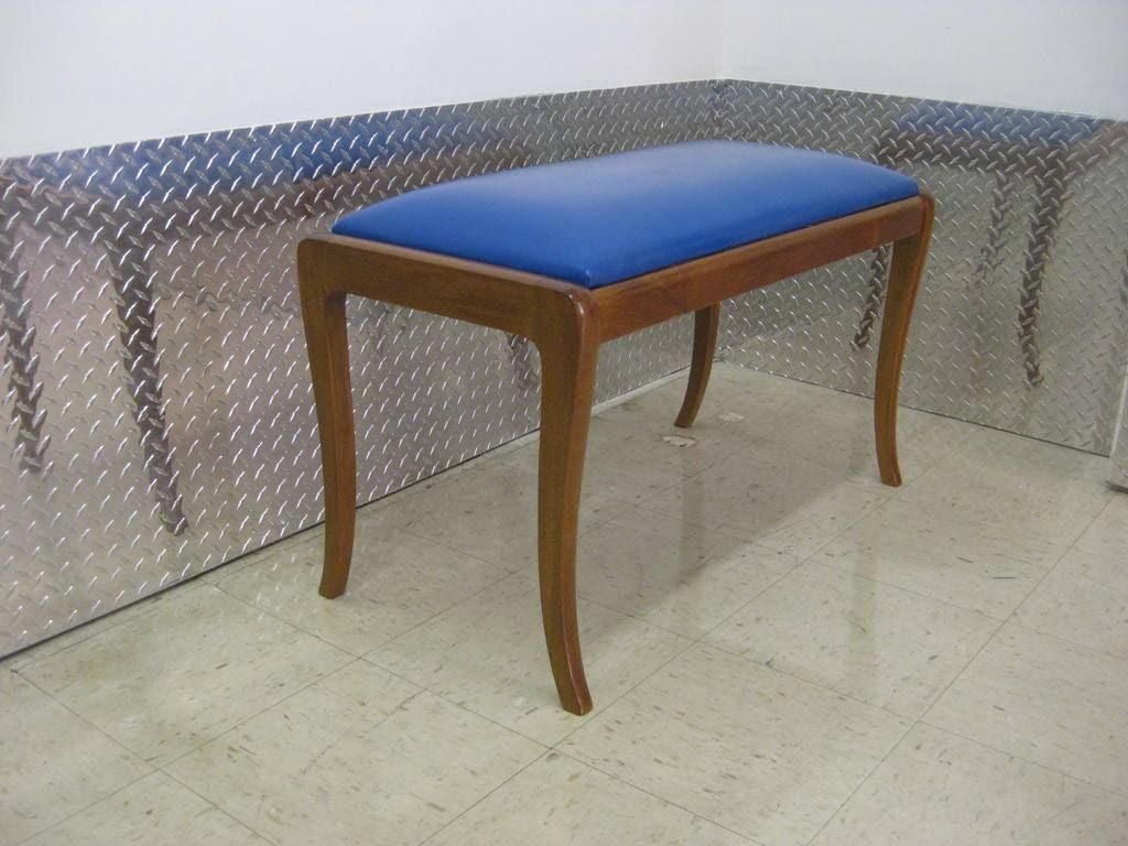 Klismos legs medium size bench in the manner of T.H. Robsjohn-Gibbings, perfect for piano with completely new leather upholstery, done in Sapphire blue.