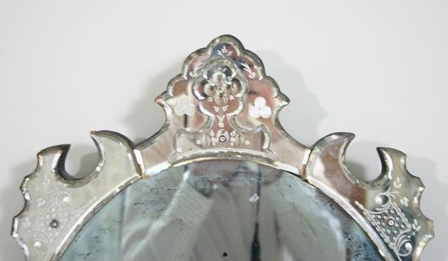 A Late 19th Century Oval Venetian Mirror with etched glass