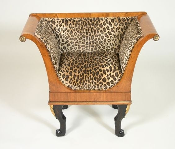 A Pair of Russian Early 19th Century Empire Period Window/Hall Seats; having gilt florets, geometric inlay, and raised on ebonised, acanthus carved and gilded legs ending in paw feet.