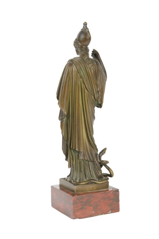 Pair of Patinated Bronze figures on marble bases of Athena and Attendant. Athena (Greek Goddess) of Wisdom, War, and The Arts. (Minerva in Roman Mythology)