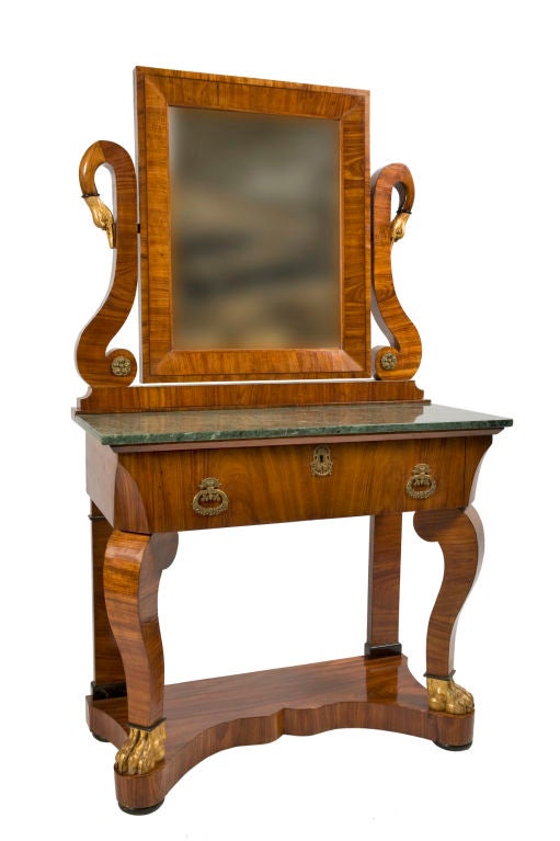Neoclassical style Mahogany part gilded dressing / writing table with swivel mirror and marbletop.