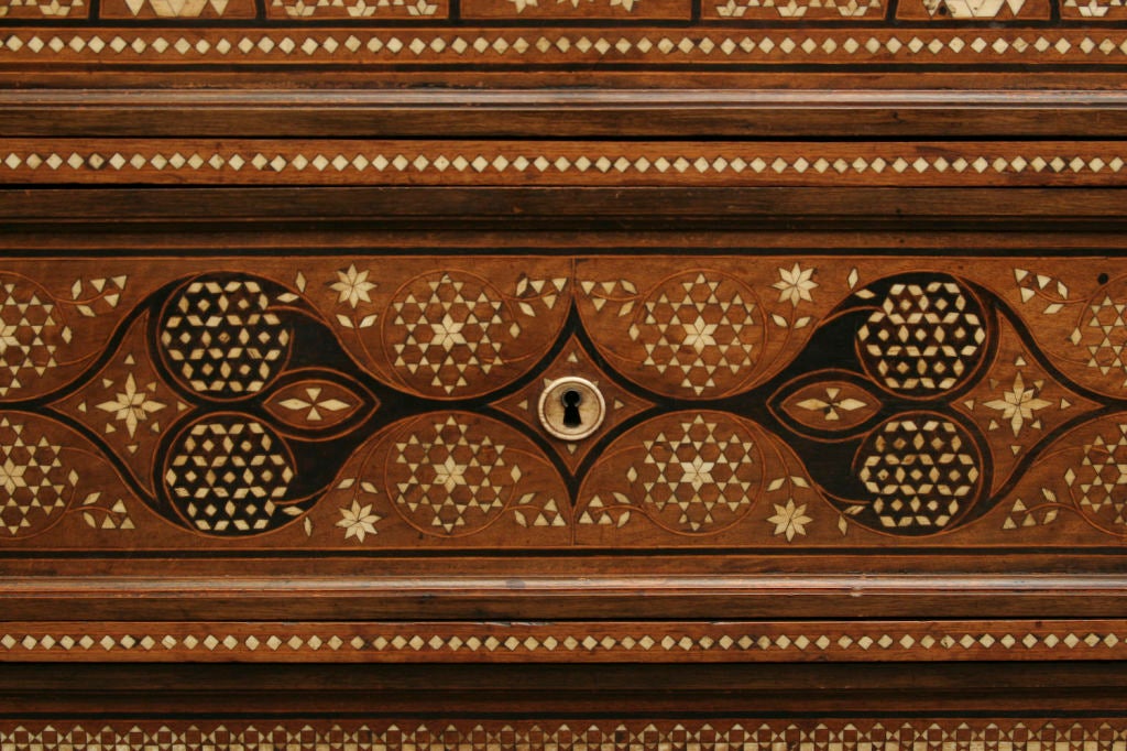 Rare and unusual Renaissance style walnut buffet with bone and ivory inlay in the Orientalist taste.