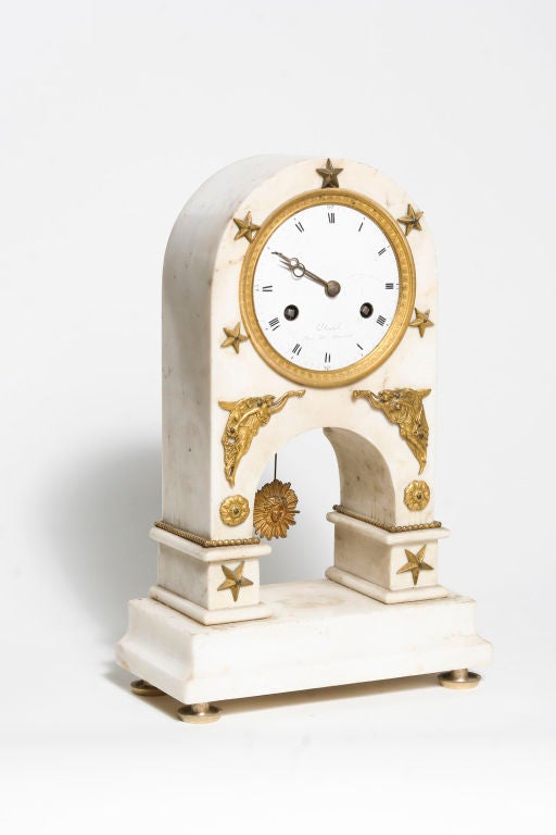 Directoire period white carrara marble clock fitted with fine gilt bronze mounts - the enamel dial 