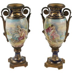 Pair of Signed Sèvres Style Porcelain Urns