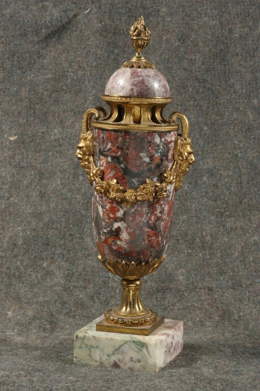 Pair of Louis XVI style Brèche Violette marble and gilt bronze cassolettes.