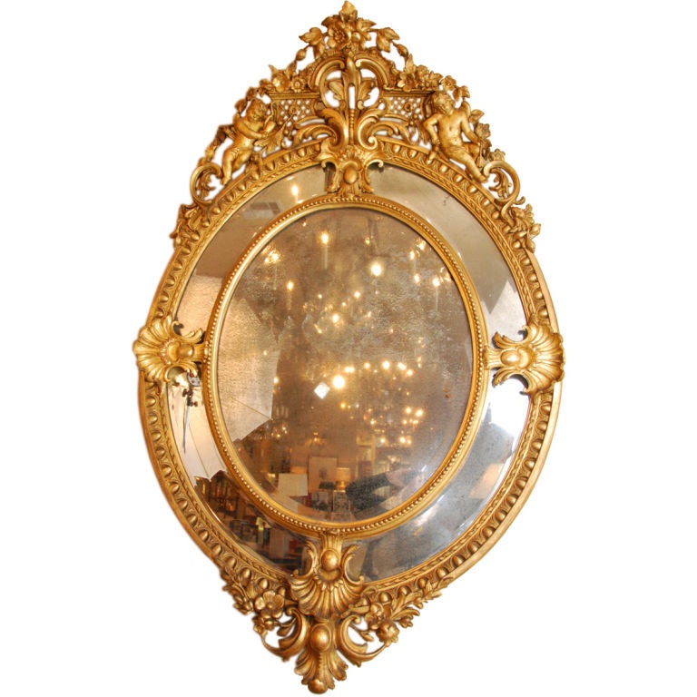 Gilded Oval Mirror For Sale at 1stDibs