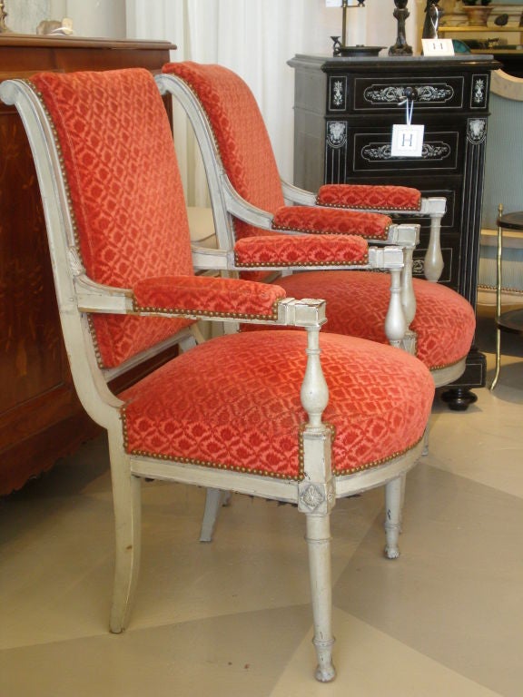 Fine Matched Pair of French Grey Painted Fauteuils,<br />
one 18th Century, one 19th Century