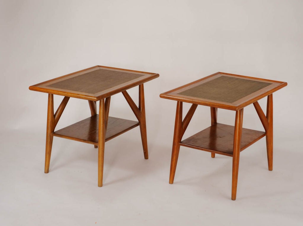Nice pair of oak side tables. These architectural tables feature inset grass clothe tops.<br />
Manufactured by the Jamestown Lounge Co.