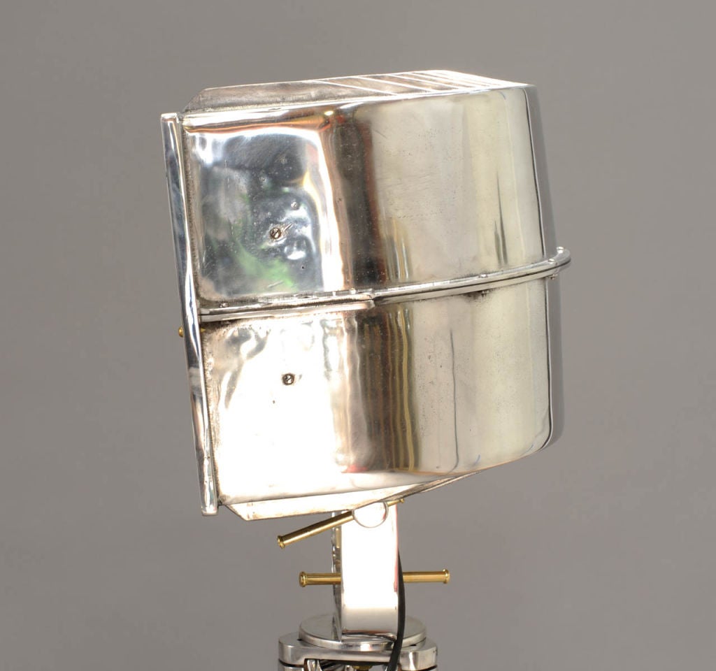 Aluminum Curved Mirror Construction Light on a Distinguished Tripod