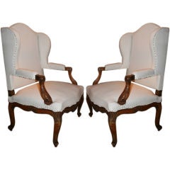 PAIR OF LOUIS XV STYLE CARVED WALNUT ARM CHAIRS, C.1870