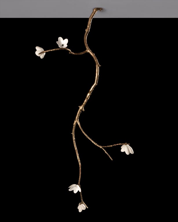 Unique large ceiling mounted branch sculpture in bronze with five white porcelain blossoms. Designed and made by David Wiseman, USA, 2009.