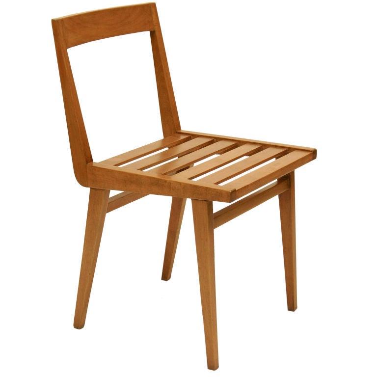 Set of four chairs with slatted seat in pau marfim (ivory wood). Designed by Joaquim Tenreiro, Brazil, 1958.(Seat height: 17