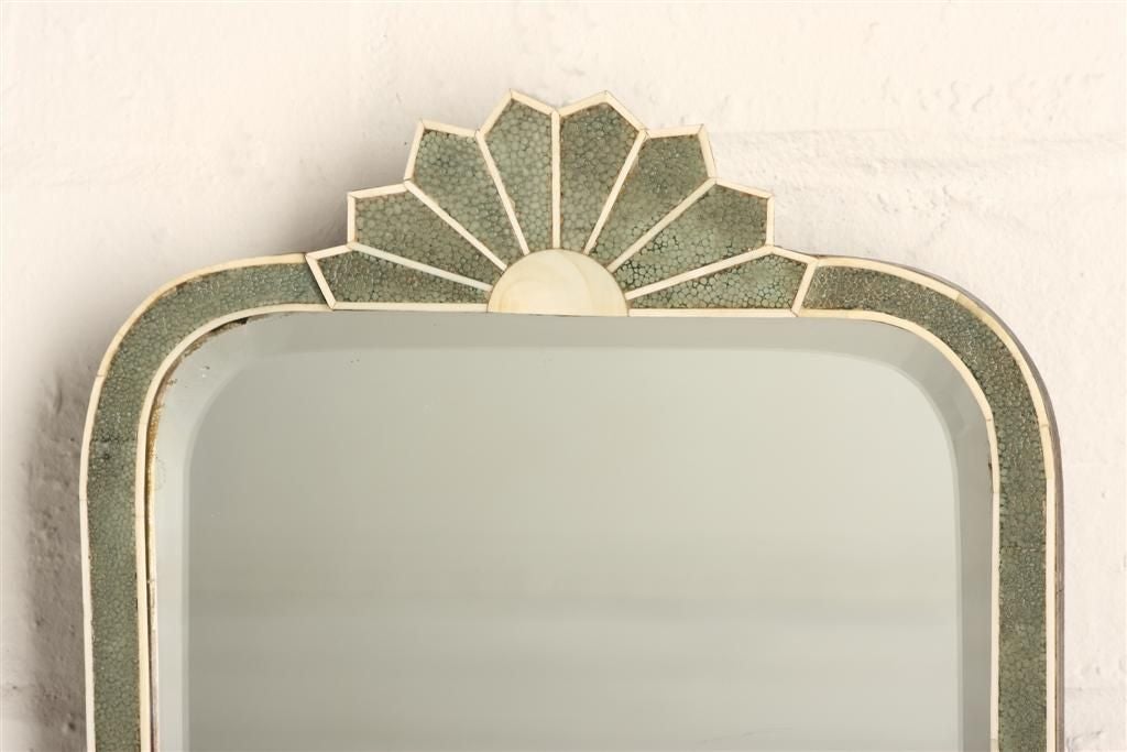 The plate framed in ivory and shagreen with a ‘rising sun’ motif to the crest.
