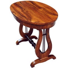 Rare oval German Biedermeier lyre table with a drawer