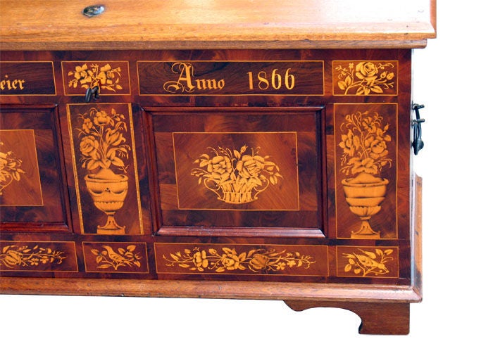 Exemplary for the very small region of 'Vierlande', closed to Hamburg with a limited number of wealthy farmers who traditionally honored the bride with a wedding chest. I haven't seen more than 2 chests of this kind in 43 years. Walnut - colored