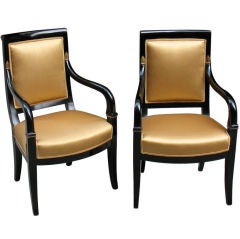 Elegant pair of ebonized Biedermeier arm chairs