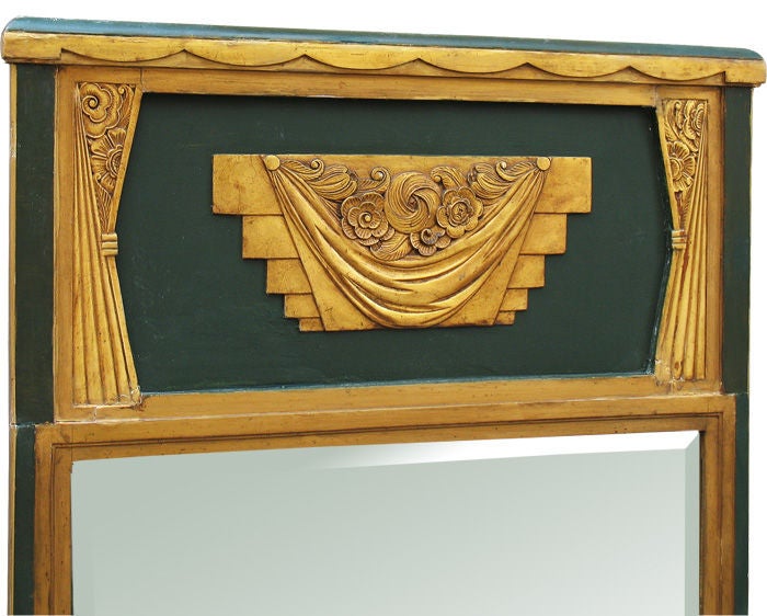 Outstandingly decorated and original (touched - up) green and gild painted French Art Deco pier mirror. Top with exemplary botanical and ornamental Art Deco motifs. The combination of colors and motifs and the finest quality of the plaster relief