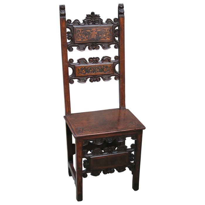 Two single "Lombardian" post chairs in walnut and maple with characteristically carved cross boards and inlaid panels. The "Lombardian" chair was created in 16th century Italy Lombardy and produced in Switzerland as well as in