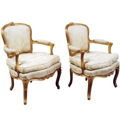 Pair of French Rococo Giltwood Bergeres